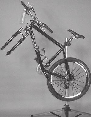 Note: For the HFX-Mag, the bike should be in the stand with the front wheel higher than the rear at a 45-degree angle and the lever should point up at a 45-degree angle.