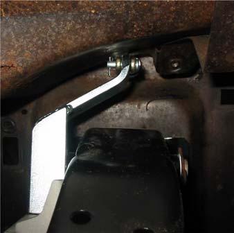 13. Bolt on the bracket to clutch pedal.