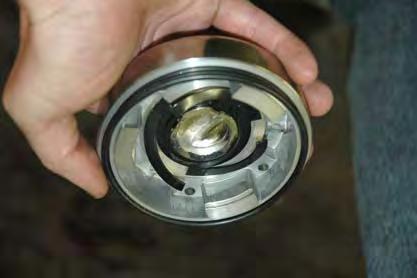 17b -Install the large snap ring into the groove in the wheel hub. 17b 18 -Step 18 has been omitted.