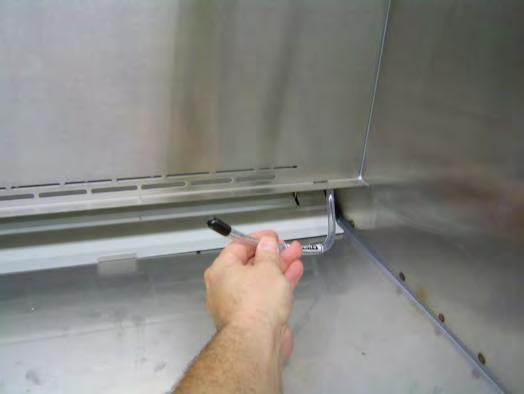 Figure 5-10 3. Pull the tube toward the front of the unit. Remove the access tube cover. 4. Using an appropriate photometer, connect the unit's upstream line to the access tube.