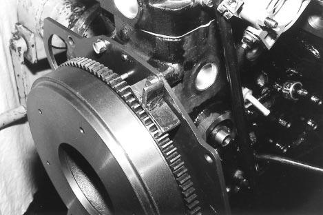 SERVICE MANUAL FOR SGR19 & SGR17 (15) Removal of the flywheel. Chock the flywheel. Removal of the flywheel. 3.