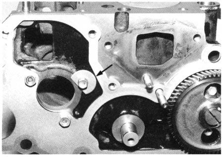 Fig. 3-108 Install the idle gear. Apply engine oil to the bore of the gear in advance.