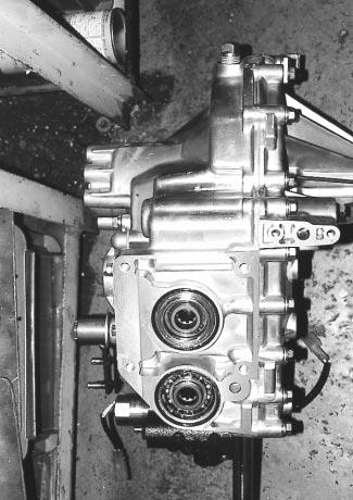 3. REAR WHEEL DRIVING MECHANISM CHAPTER 4. TRANSMISSION & RELATED PARTS Fig. 4-3 DISASSEMBLY (1) Remove the transmission assembly from the chassis, referring to component removal.