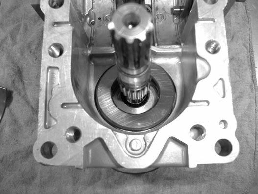 (3) Reassembly of the slant board and thrust bearing a. Install the thrust bearing (13) into the case (1).