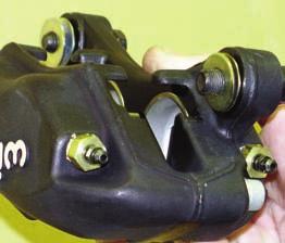 Determine that the appropriate snap ring style Green bearing has been installed on the axle, as shown in Figure.