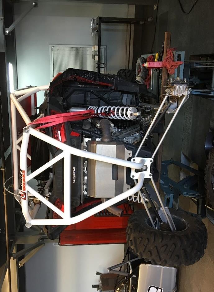 PRE-ASSEMBLY / REMOVAL RZR SUPERCHARGER KIT 1. Jack up vehicle and place on Jack Stands or use a lift (as pictured).