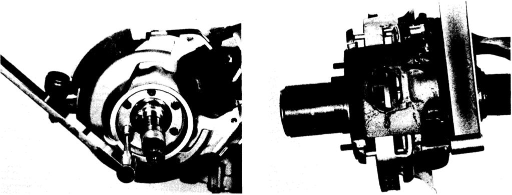 FRONT AXLE Figure 50 1009-50 Figure 52 1009-52 Assemble brake shield bracket assembly to spindle using new torque prevailing nuts.