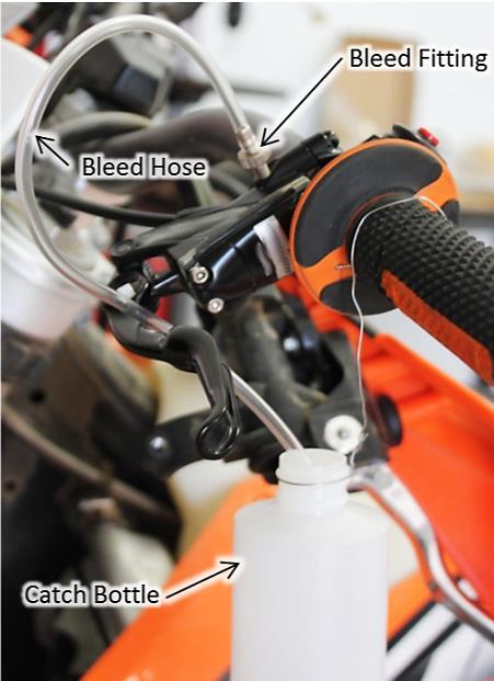 Pull the brake line tight, ensuring that the MC, notably the bleed fitting, is the highest point in the brake system, there are no dips in the line, and the line is as vertical as possible.
