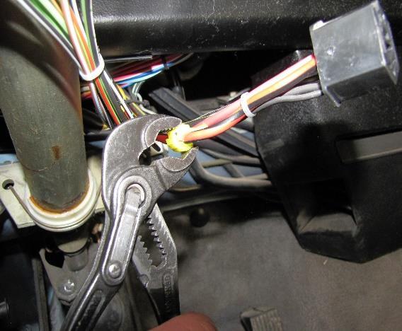 If you do not have the relay, use the supplied #10 self-tapping screw and attach the ground next to the fuse holders. 23. Connect Wire #2 and Wire #10 to the aux.