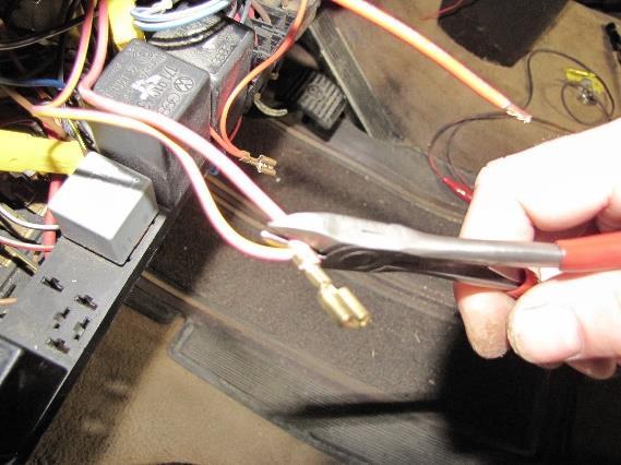 Both of these wires will be crimped into the same connector and connected to the top terminal of fuse #8 (Fig.11) 2. Also disconnect the smaller gauge red wires from the top terminal of fuse #8. 3.