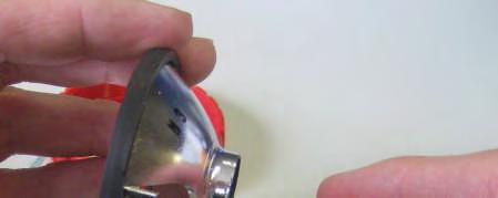 Remove wax seal (if applicable) from lock screw. 2.