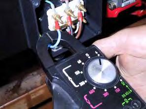 Select the multimeter in Ohm and check if there is continuity between terminals U, V and W of the motor (Fig.69). Fig.70 MACHINE UNDER TENSION DANGER OF ELECTRIC SHOCK Fig.