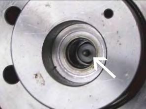 Check if the chuck turns free by hand: if not the shim is dropped and it must be placed correctly. Tighten the rest of the bolts very carefully by using a dynamometric wrench regulated at 8Kgm (Fig.