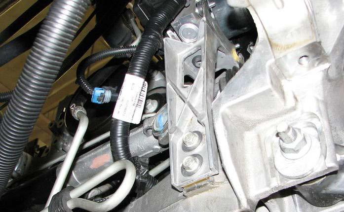 Use a 13mm socket to remove the lower brake modulator bracket bolts. 91.