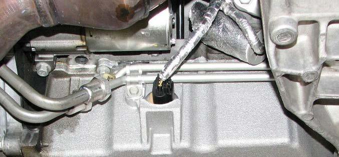 NOTE: The following six steps detail the process needed to loosen and remove the crank bolt.