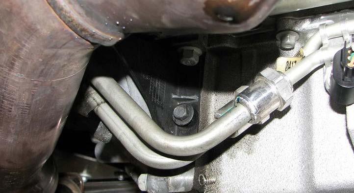 firm brake pressure while turning the crank bolt.