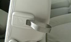 Pull outward on the handle located on the outboard side of the seat cushion and slide the seat rearward. 2. Fold the armrest(s) into the upright position. 3.