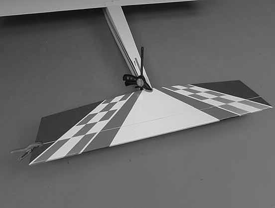 Stand back several feet behind the model and confirm that the stab is parallel with the wing.