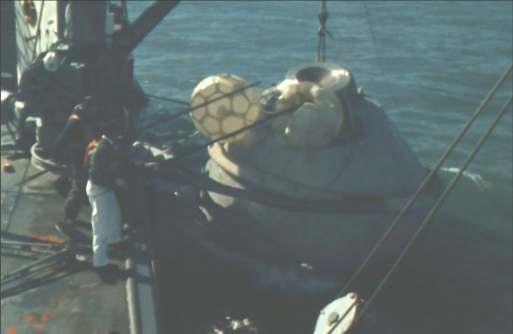 DVD). Photo #14: Block II BP-1101A being recovered after unmanned Apollo Block II uprighting