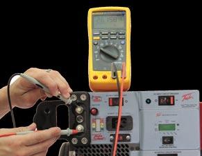 prior to use. A digital multimeter (an example is shown in Figure 3.8.1) capable of measuring dc and ac voltage and resistance will be required to perform some of the tests.