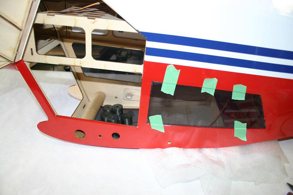 Place the windows into their cut outs in the fuse and tape in place