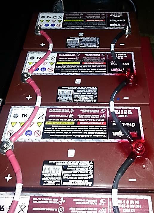 The Battery Family is Group 31 and each battery contains 105 AMPS (useable). The 4 AGM batteries are connected together with Red Cables (+) and Black (-).