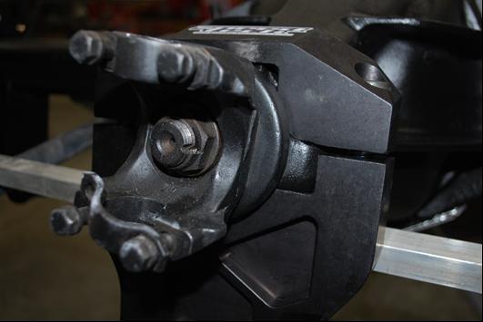 The supplied billet aluminum pinion clamp must be made to fit the pinion snout.
