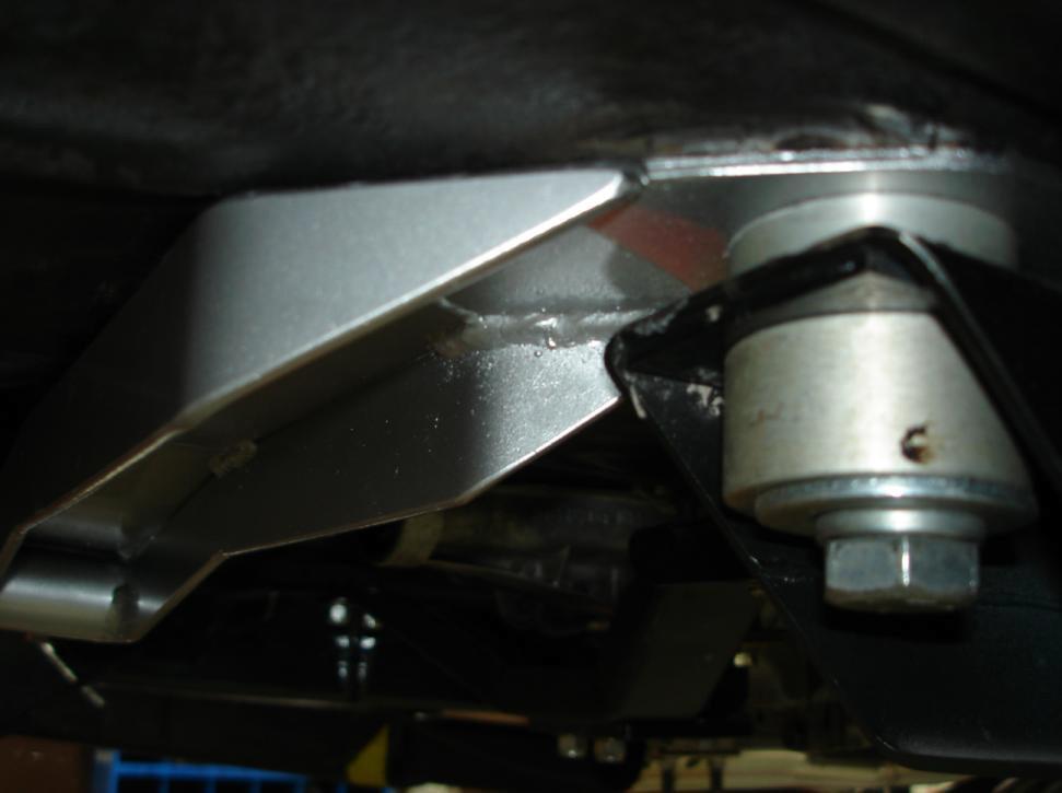 Shock and Trailing Arm Axle Mounts 7. Using the guidelines supplied with your bracket kit, the trailing arm and pan hard bar mounts need to be welded onto your axle housing.