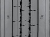 of tread compound and geometry. Winged tread for use in high scub applications.