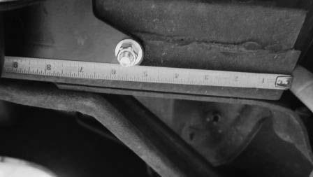 There isn t a rivet to use as a locator on the 1957 Frame. The Frame Mount is position 5 from the FRONT of the frame rail to the FRONT EDGE of the Frame Mount.