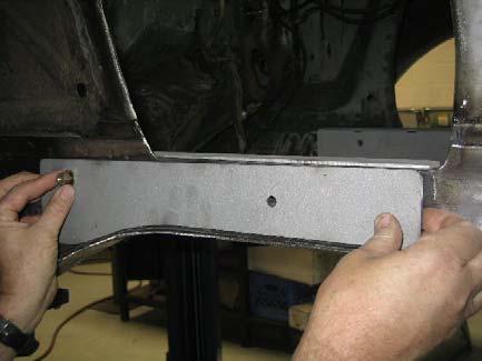 steering box hole (drivers side 7/16 x 3 bolt) and the upper idler arm hole (passenger side 3/8 x 3 bolt).
