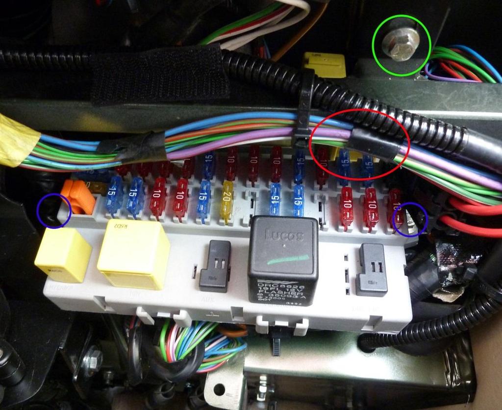 In practice, when you look underneath the dash, this is what you will probably see: It is possible to replace the relay (circled in red) without removing the fuse board. But this can be fiddly.