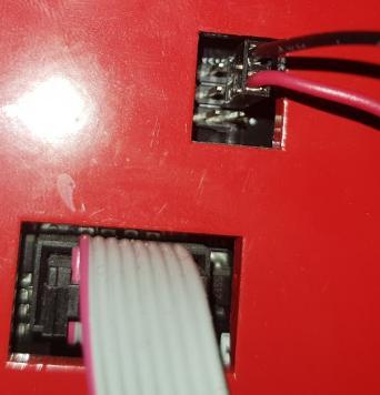 The filament sensor wire should be mounted at the back of the