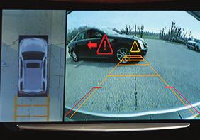 SURROUND VISION When the vehicle is in Reverse, the Surround Vision System displays a bird s-eye view of the vehicle along with the front or rear camera views on the touch screen.