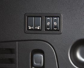 Press the Seat Release button (A) on the panel behind the rear doors or the x2 x2 button (B) in the rear cargo area to fold the seat forward. Press either button again to tumble the seat forward.