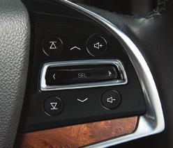 + Volume Press the + or to increase or decrease the volume. Next/Previous Press or to go to the next or previous favorite radio station or track. See your Cadillac CUE Infotainment System Manual.