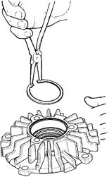 Take care not to scratch or damage the sideplate. 2. Using a properly sized seal punch, tap in a new wiper seal with the lip down, facing the rotor, to the full depth of the recess ; See figure 18.