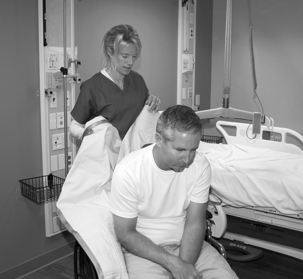 Transferring Patient from Chair, Wheelchair, or Toilet Step 1 Position Sling 1) While standing in front of or beside the patient, lean the patient forward several inches to place the sling behind the