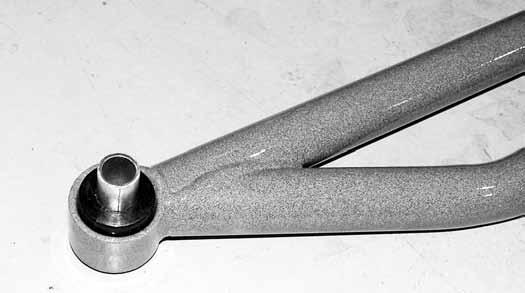 Fig. 2 6. Attach a preassembled traction bar to the axle bracket with a 9/16 x 3 bolt, nut and 9/16 SAE washers.