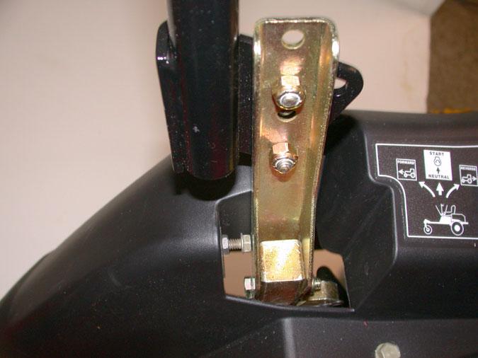 To adjust the neutral return assembly, loosen the socket head cap screw that holds the centering bracket in position on the housing using a 1/4 allen wrench. See Figure 10.5. 10.7.