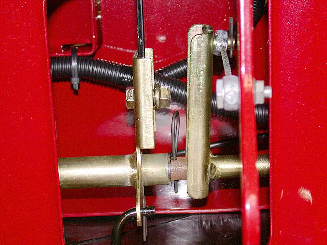 6. 17.8. Using two 9/16 wrenches remove the bolt, nut, and spring on the brake handle on the left handle side of the deck lift shaft. See Figure 17.8. Bolt Spring Nut Figure 17.8 Figure 17.