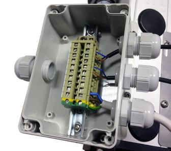 The junction box is supplied with three cable glands on one side PG11 and one on the other side PG13,5. It has 10 terminal blocks and one terminal block for earthing as standard.