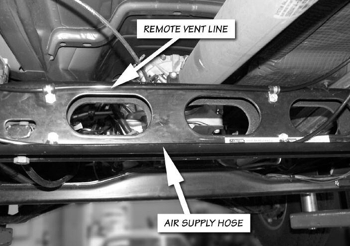 Section 2 BANKS BRAKE INSTALLATION 50. Route the pneumatic hose from the compressor panel to the driver side of the vehicle by following the engine wiring harness.