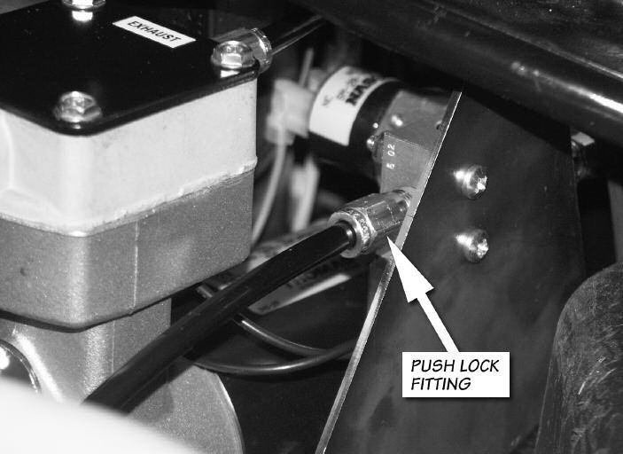19. Attach the pneumatic hose to the air compressor panel by inserting the hose into the push-lock fitting as shown in Figure 5. 20.