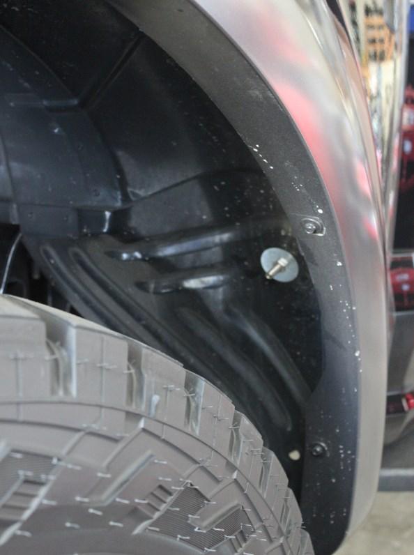 For the Rear you will locate the smooth area of the fender well in front of the tire (Front Side