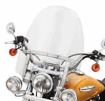 The shield should manage airflow and wind blasts to create a pocket of still air for both rider and passenger comfort.