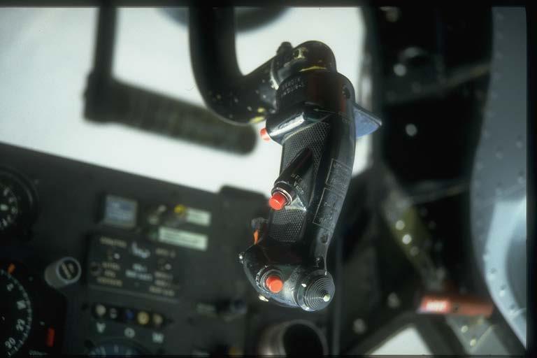 To operate, the hand wheel must be pushed down to engage the adjuster assembly. Attached to the seat there is a standard seat belt and shoulder harness restraint system.