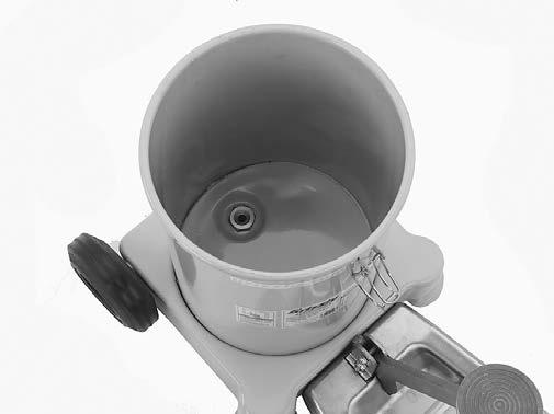 Filling 1. Remove lid assembly from grease drum. 2. Fill drum with bulk grease, ensuring that grease inlet (see Figure 6) at bottom of drum is completely covered and no air pockets remain.