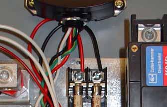 Page 6 Effective: February 2005 Figure 16. TVSS Fuse Block Mounted in a SE ATSs. Note: The length of the four (4) TVSS wires can affect the performance of the TVSS.