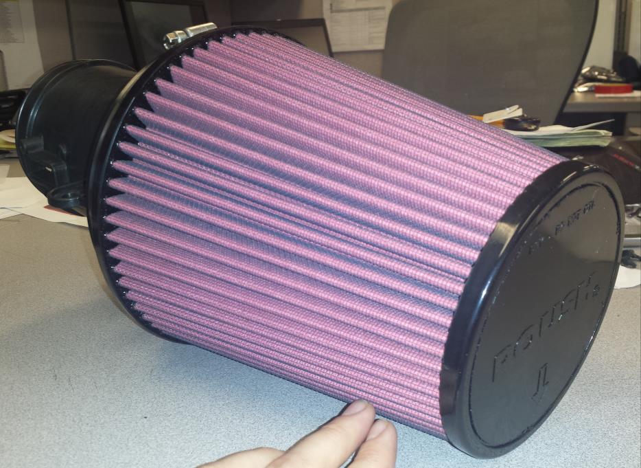 7. Loosely attach the air filter (131550-9601R) to the filter tube, leave the clamp loose so you can hide it once installed on the car.